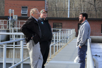 Moonshot team conversing at facility plant