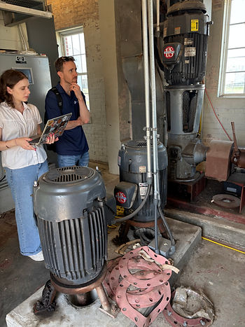 Cynthia on a site visit to Crisfield this summer with Moonshot Missions team member, Nick Meurer